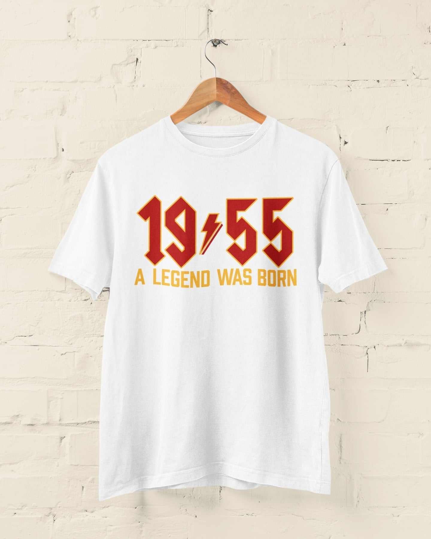 Personalised 70th birthday t-shirt with "1955 A Legend Was Born" design, customizable with a name on the back, perfect for 2025 celebrations.