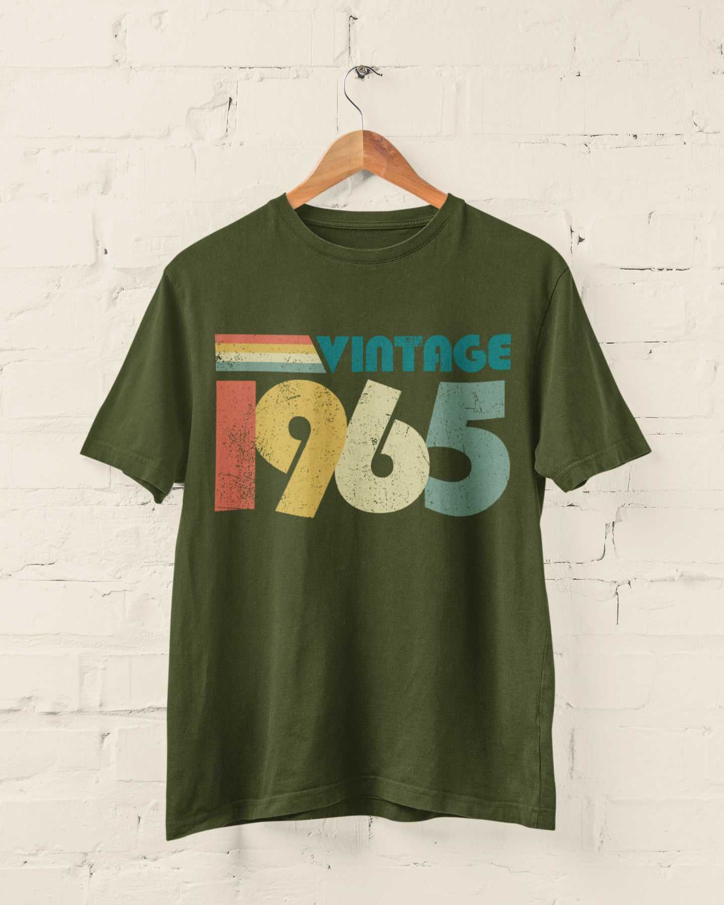 Vintage 1965 retro style t-shirt for 60th birthday gift, green fabric with bold colorful print.