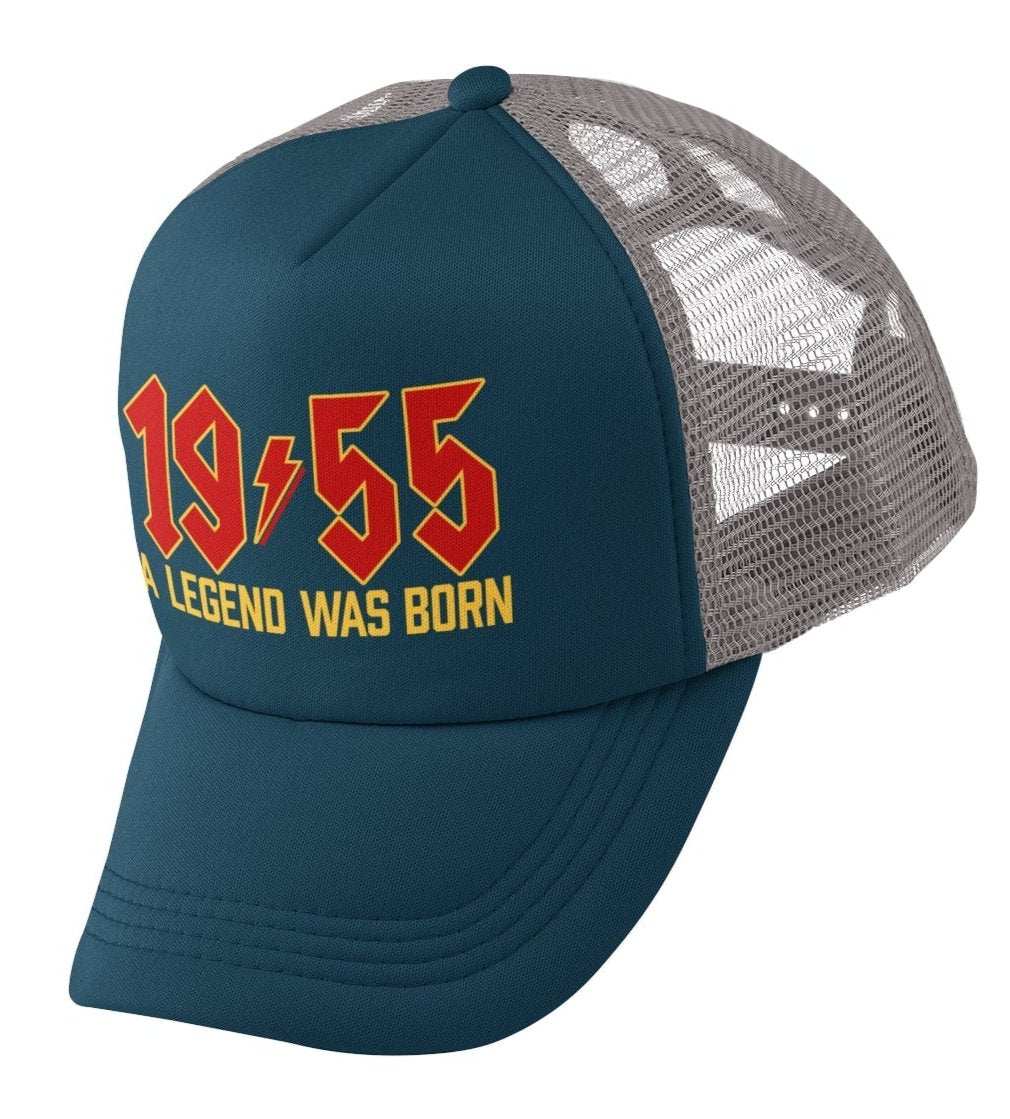 70th birthday trucker cap with "A Legend Was Born in 1955" in retro rock font.