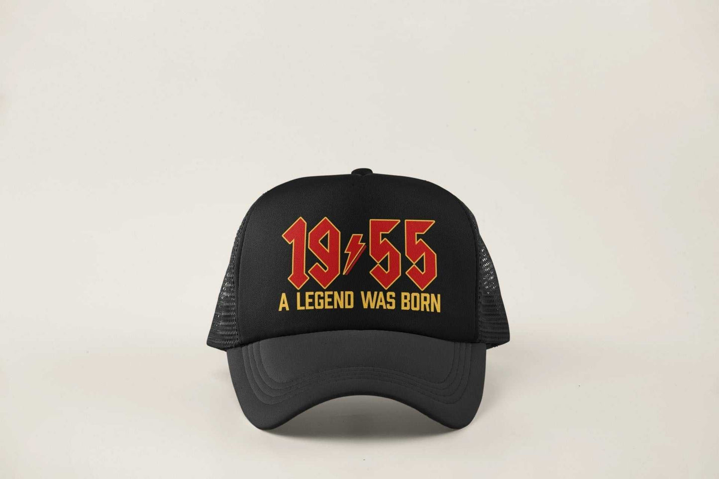 70th birthday gifts 2025 trucker cap with "1955 A Legend Was Born" retro rock font.