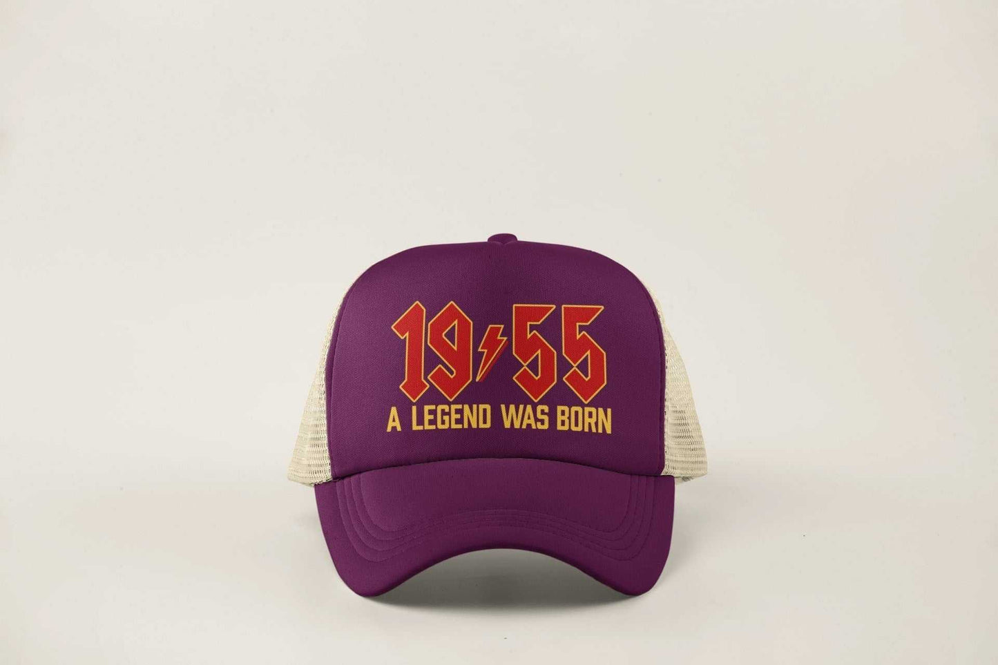 70th Birthday Gifts 2025 Trucker Cap featuring "1955 A Legend Was Born" in retro rock font.