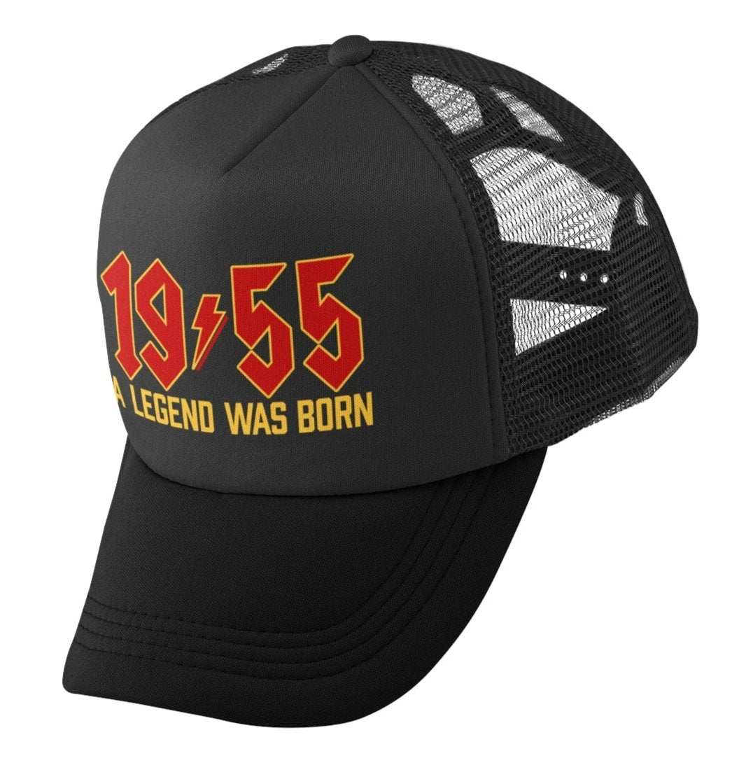 70th birthday trucker cap 2025, "A Legend Was Born in 1955" retro rock font, adjustable mesh back.