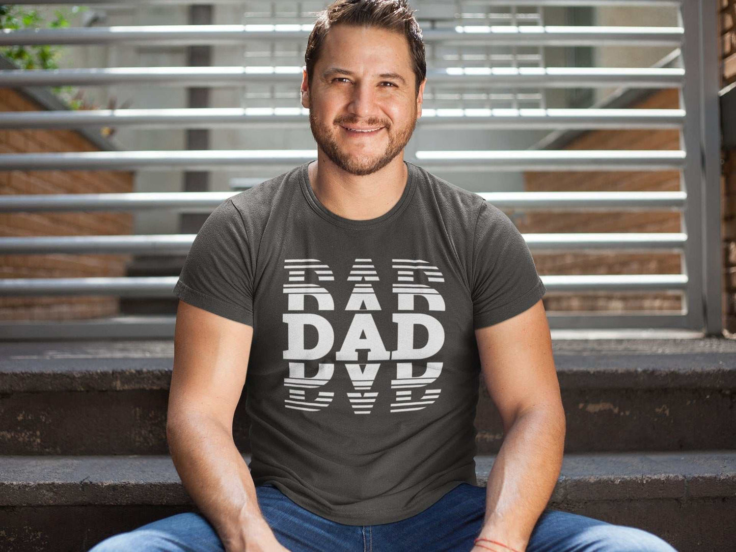 Dad typography t-shirt featuring bold design, perfect Father's Day gift for new dads.