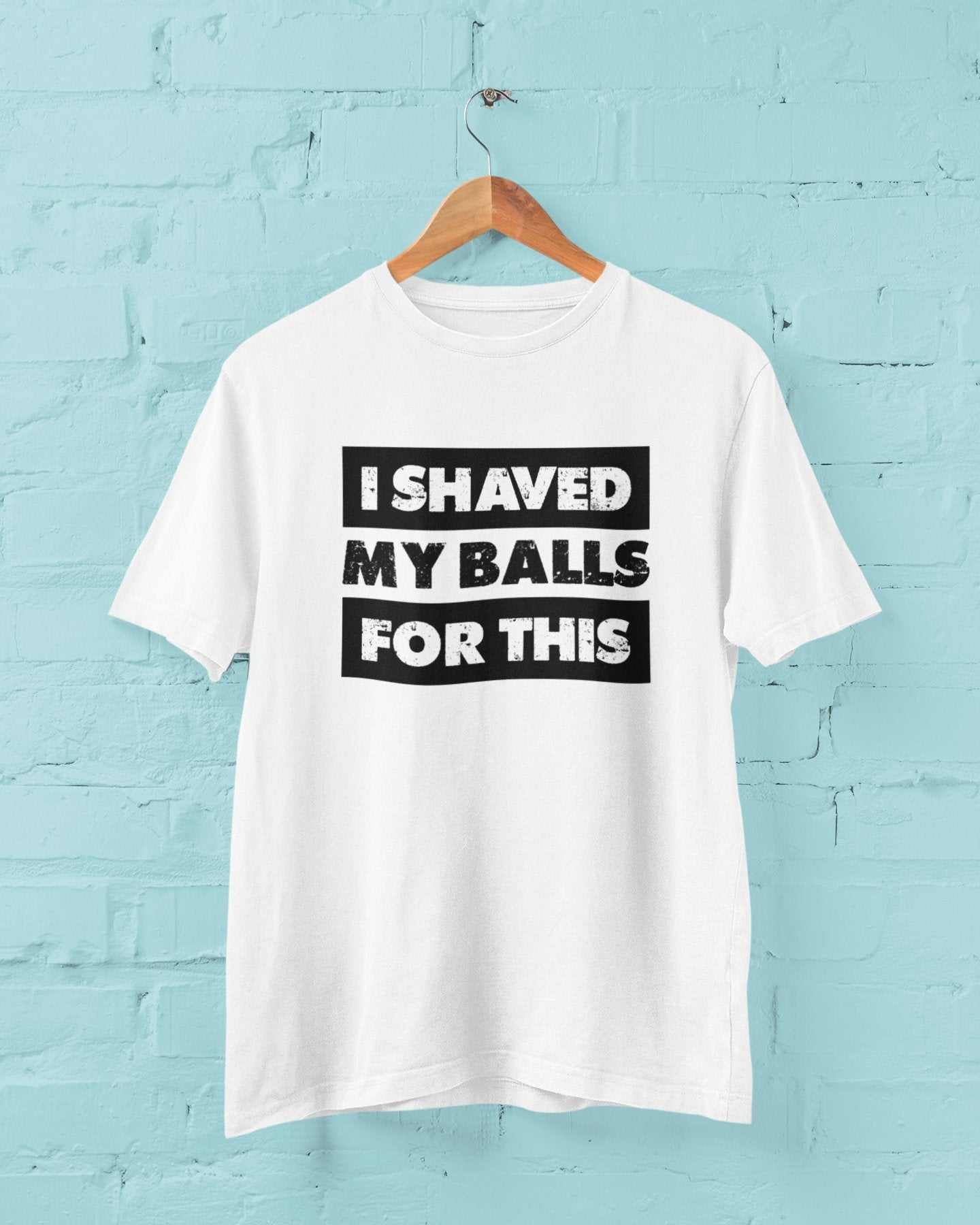 White unisex funny sarcastic rude T-shirt with "I Shaved My Balls For This" black text print