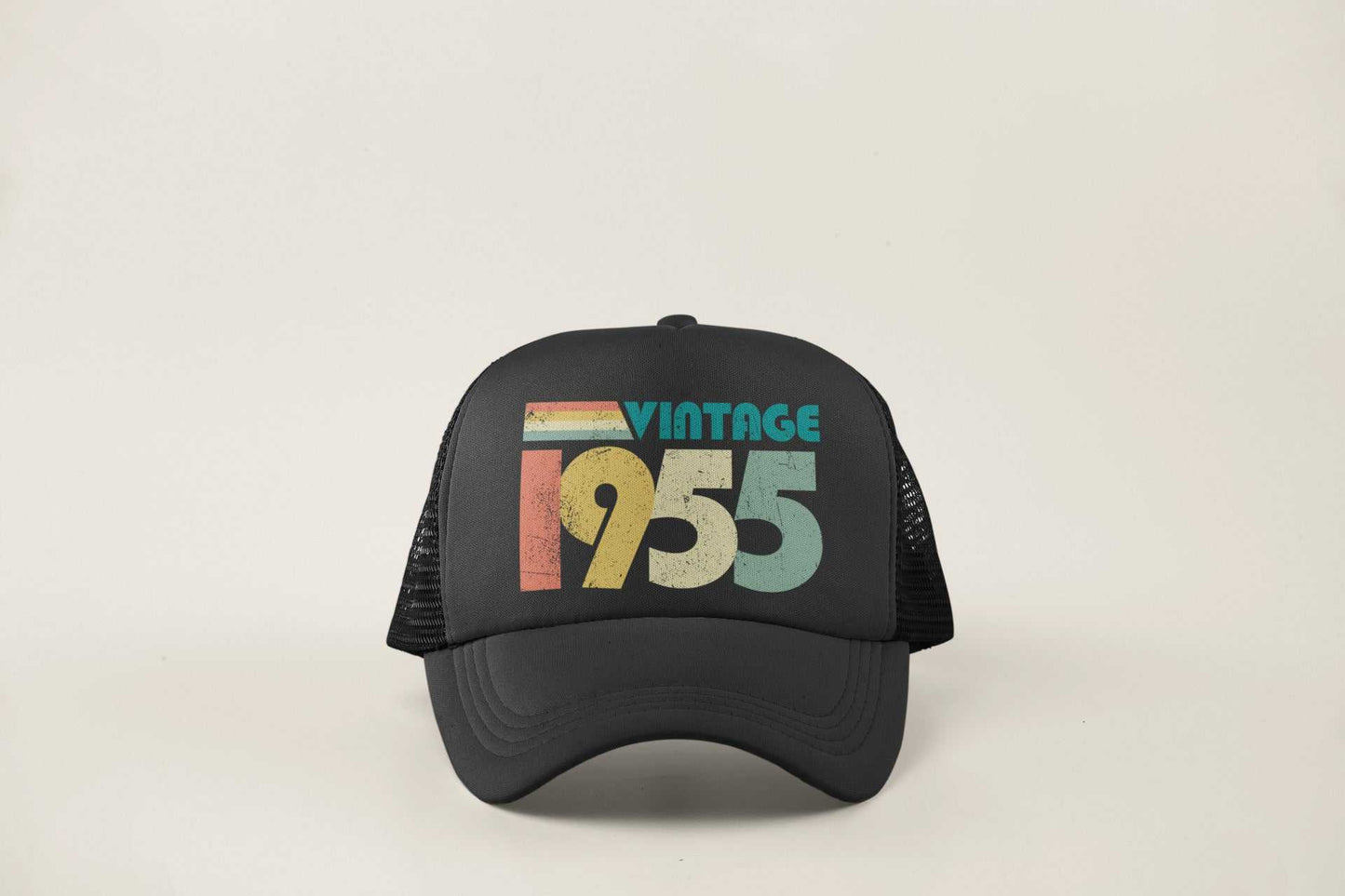 Vintage 1955 trucker-style baseball cap with retro design for 70th birthday in 2025.