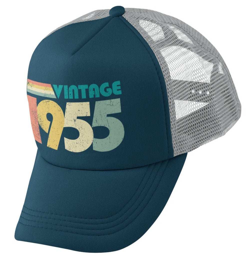 Vintage 1955 trucker style baseball cap with retro design for 70th birthday in 2025.