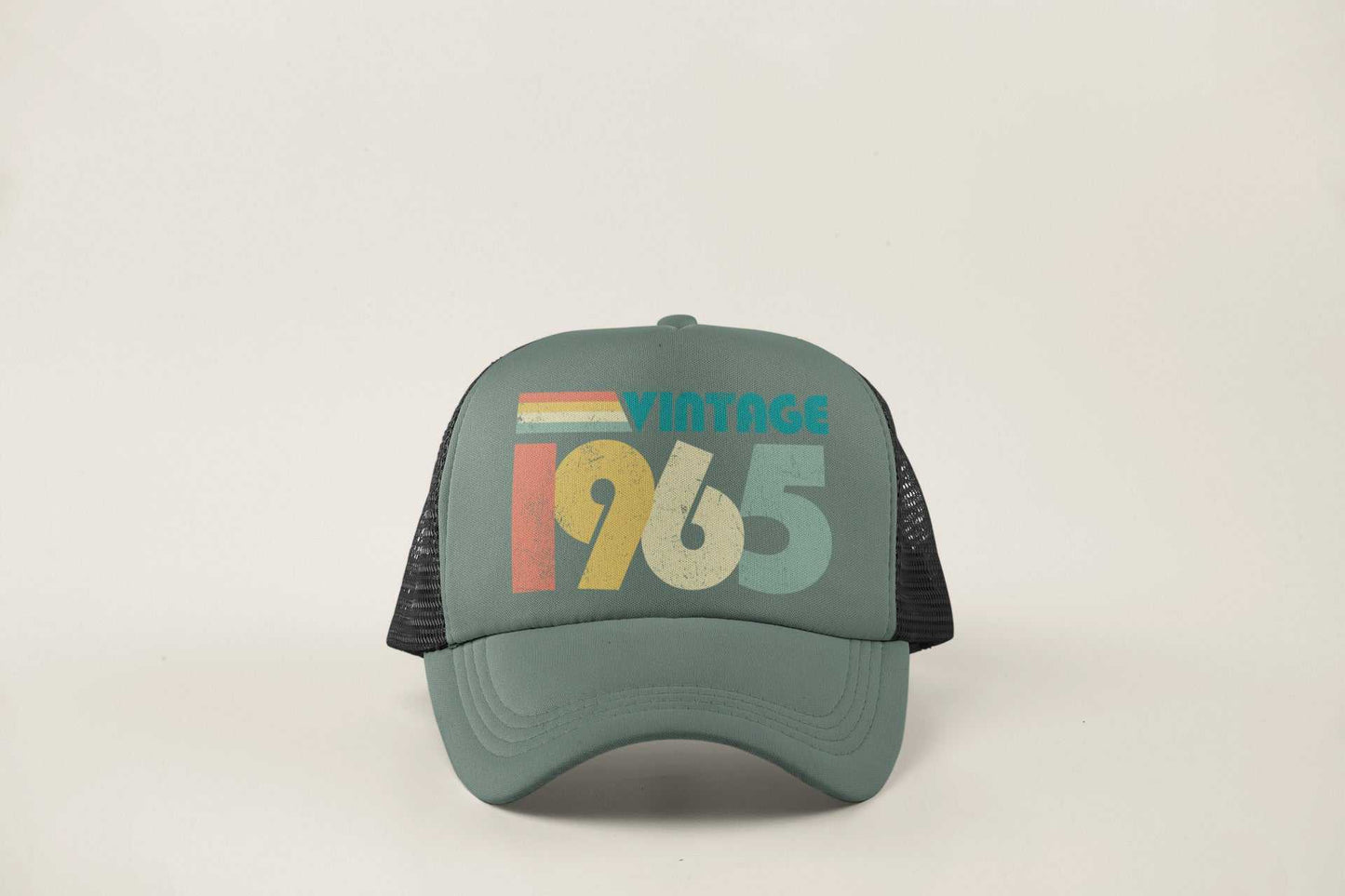 Vintage 1965 trucker style baseball cap with retro design for 60th birthday gift.