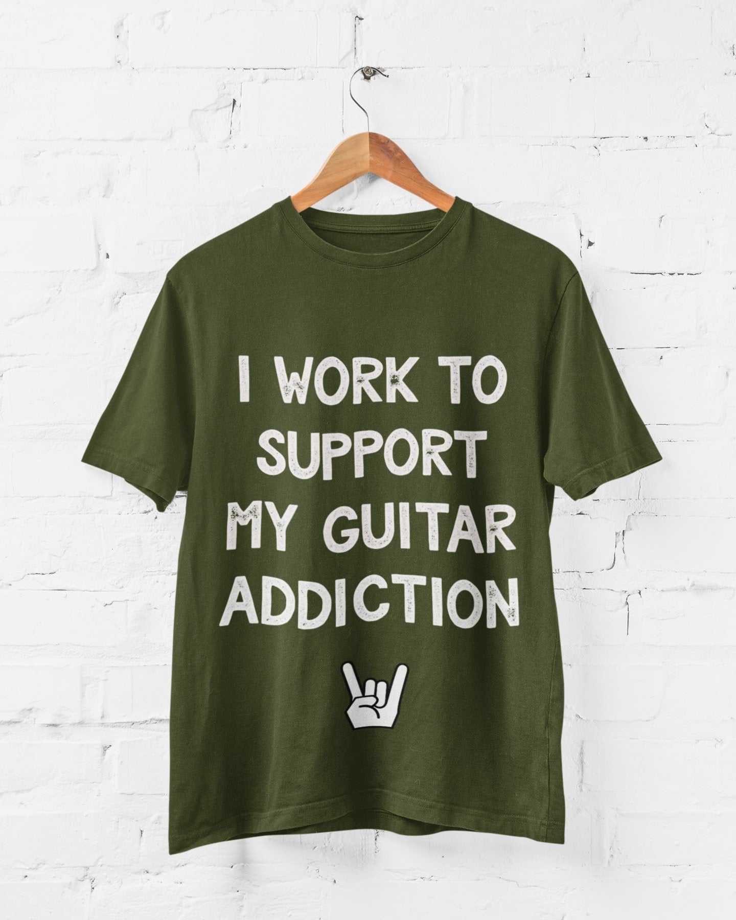 Green novelty T-shirt with "I Work to Support My Guitar Addiction" printed text, perfect gift for guitarists.