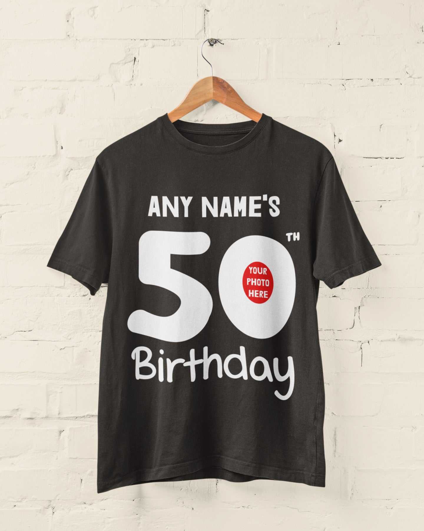 Personalised 50th birthday t-shirt with custom name and photo, black color on hanger.