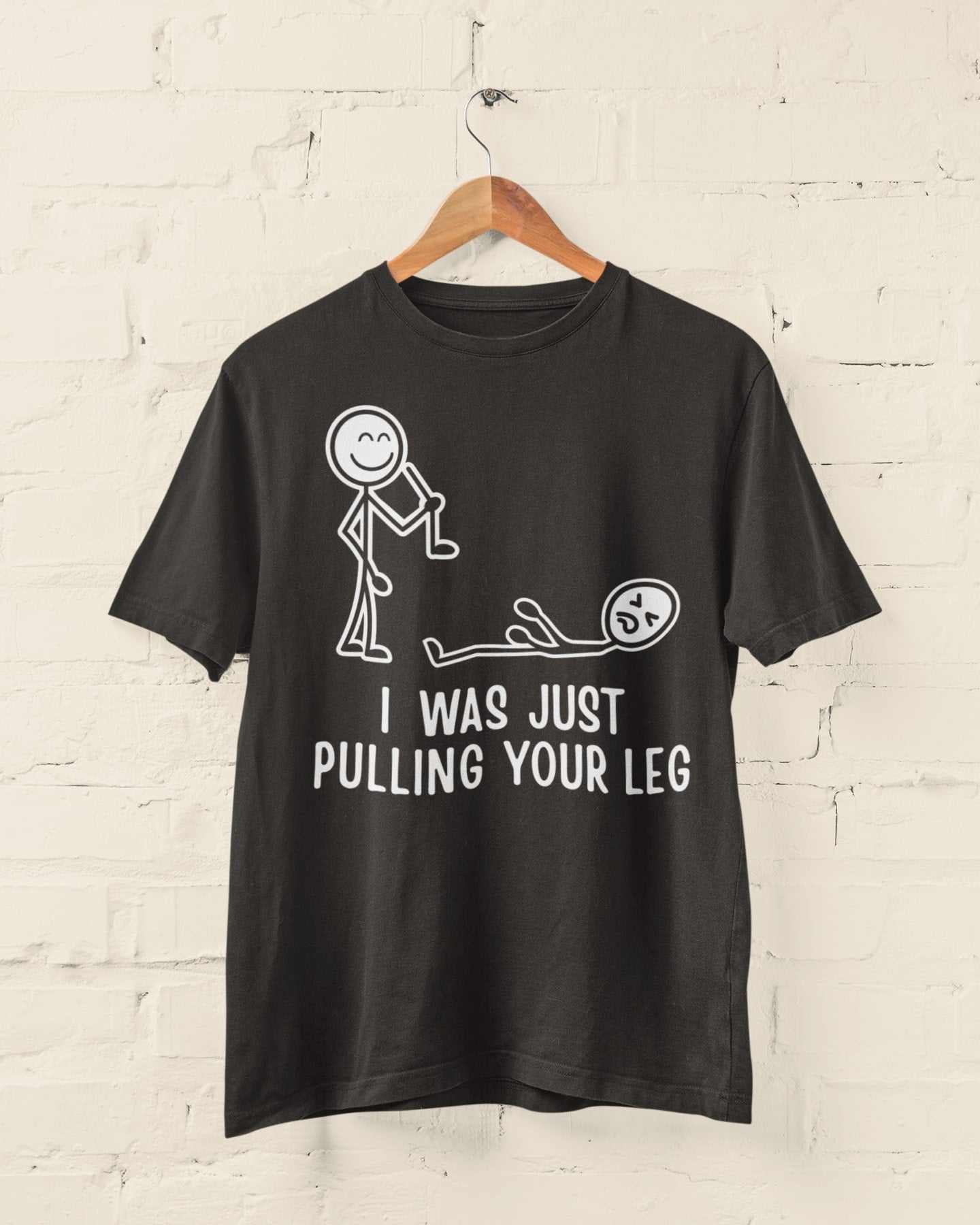Funny stick figure joke t-shirt with "I Was Just Pulling Your Leg" design.