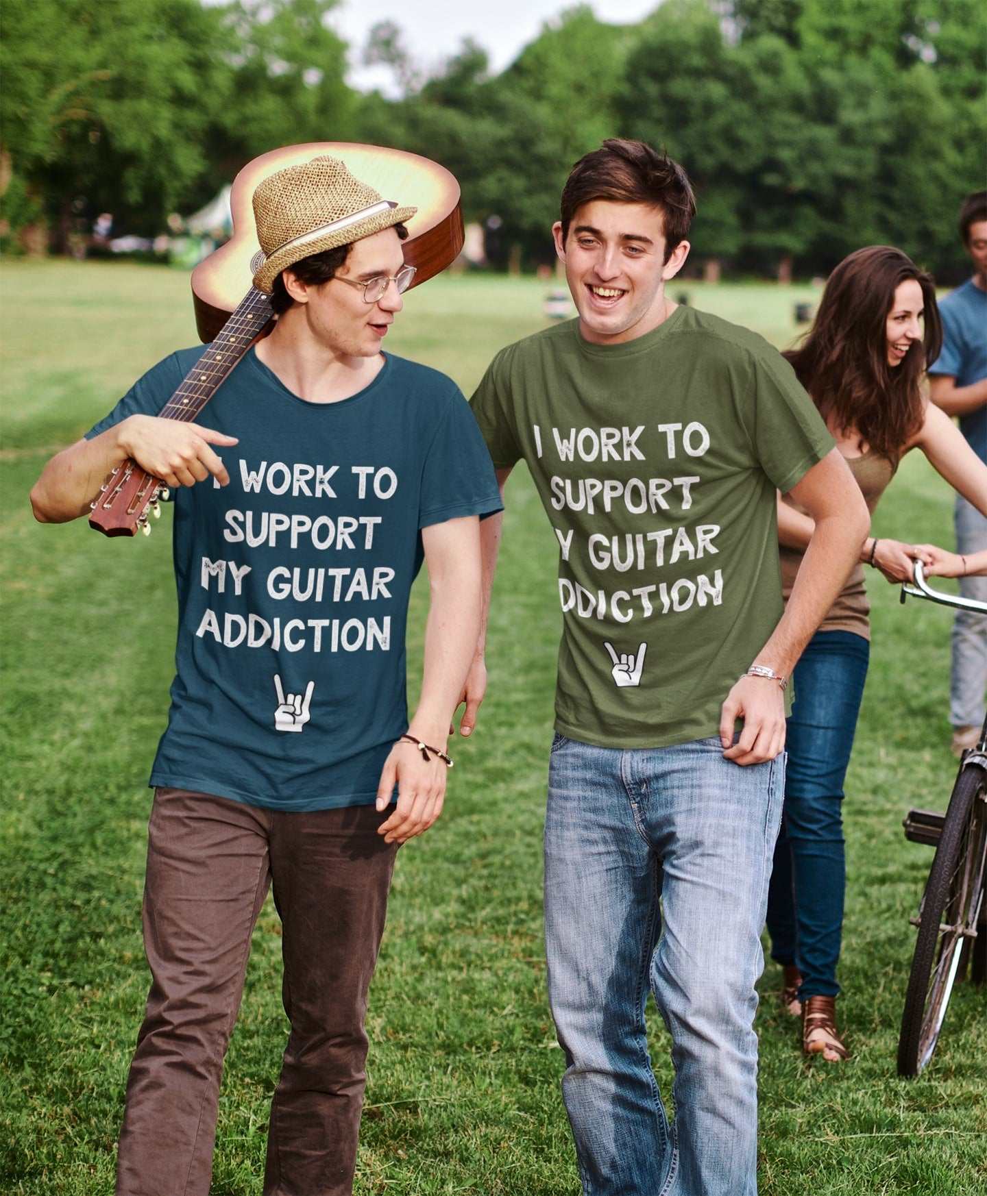 Two friends wearing novelty T-shirts with "I WORK TO SUPPORT MY GUITAR ADDICTION" slogan, ideal guitarist gift.