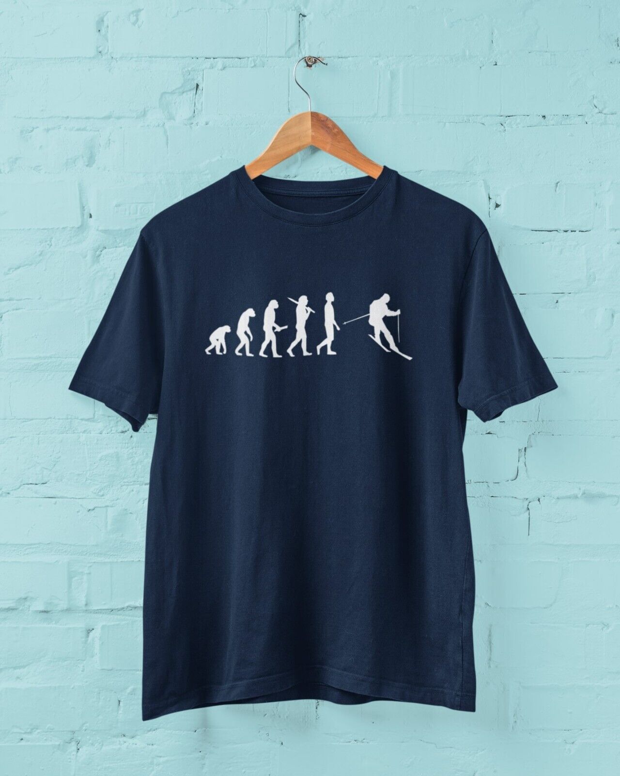 The Evolution of SKIING Funny T-Shirt Ape To Man Darwin Design For Skiers Slope T-Shirt