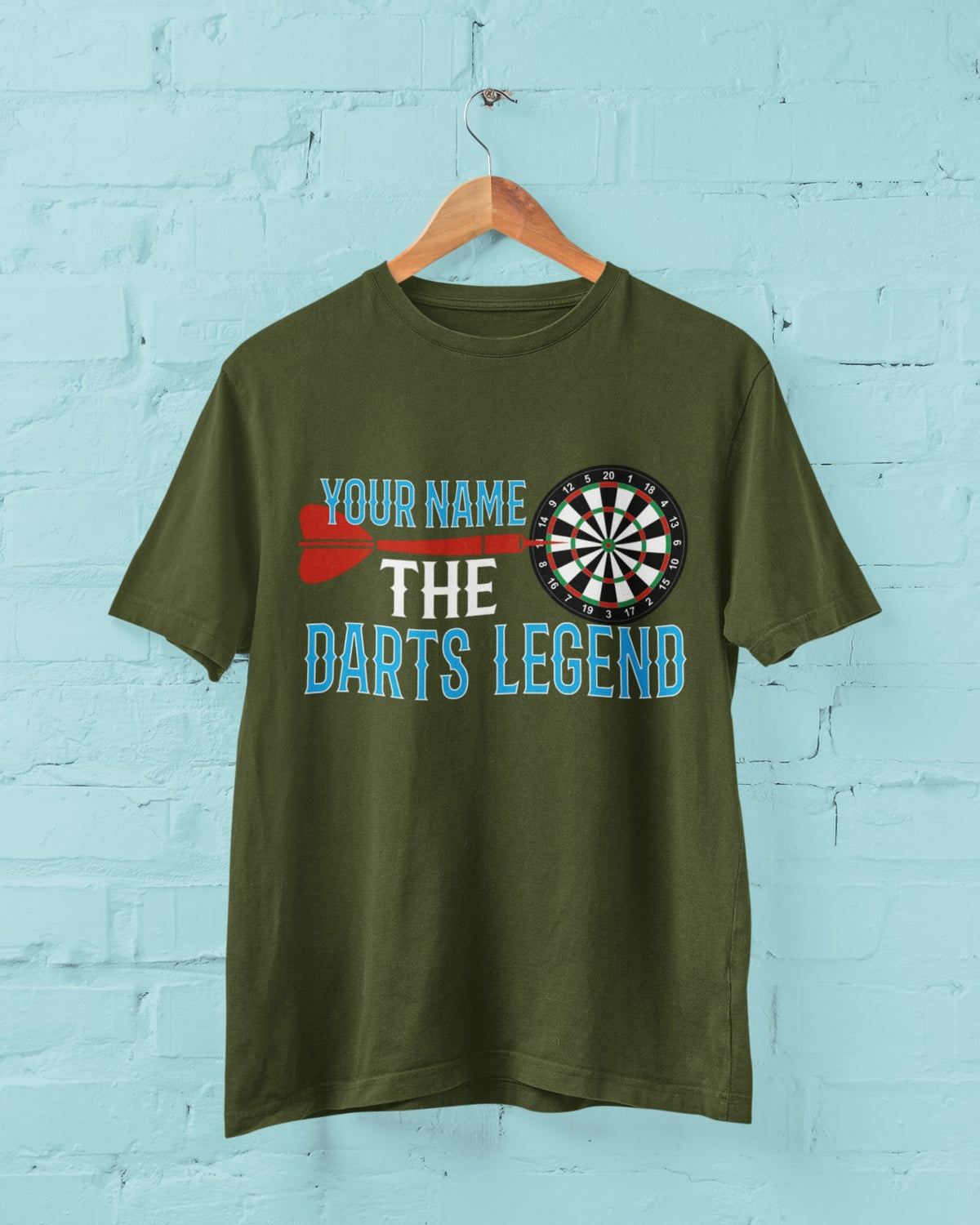 Wall display mockup of The Darts Legend personalised name graphic T-shirt
