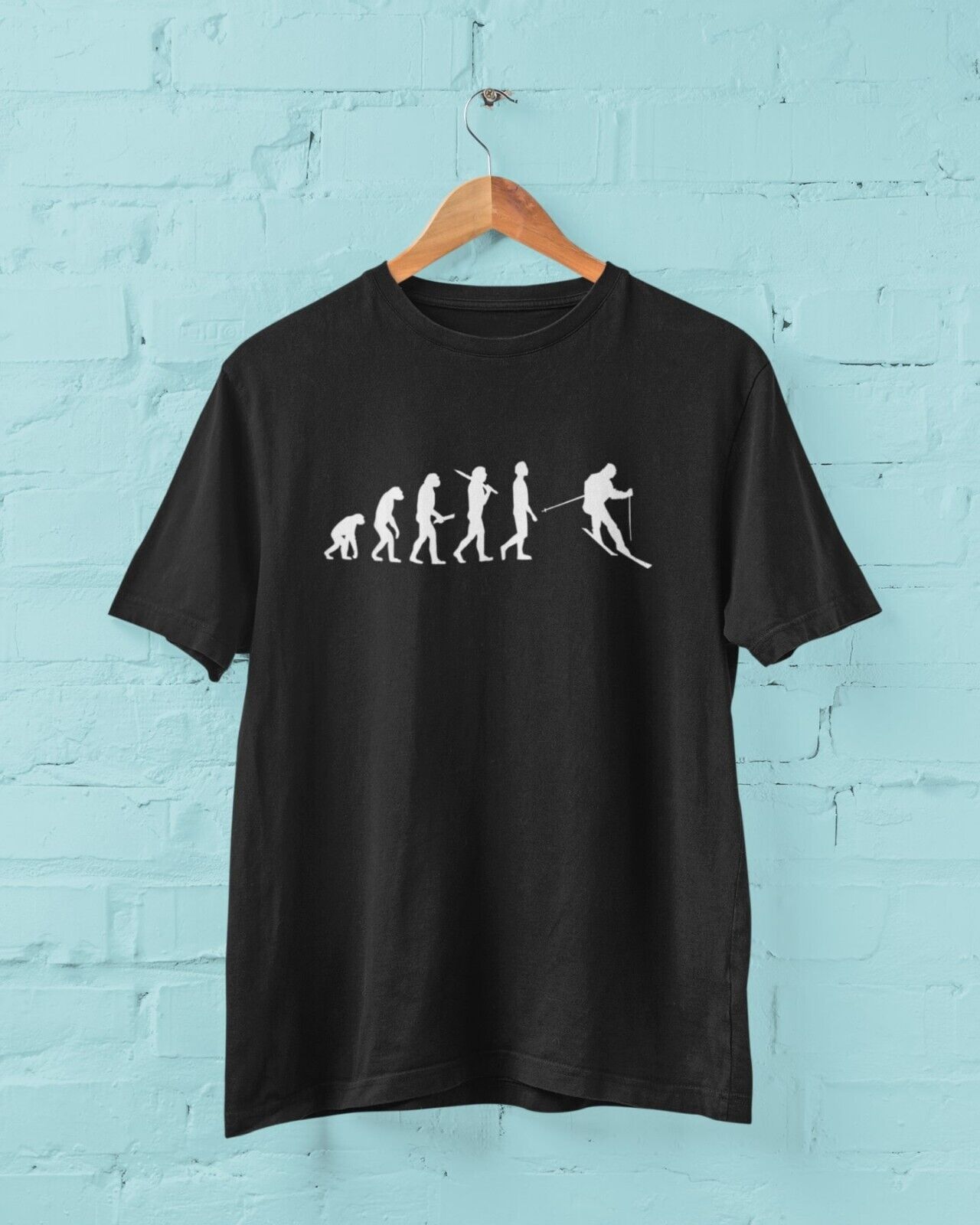 The Evolution of SKIING Funny T-Shirt Ape To Man Darwin Design For Skiers Slope T-Shirt